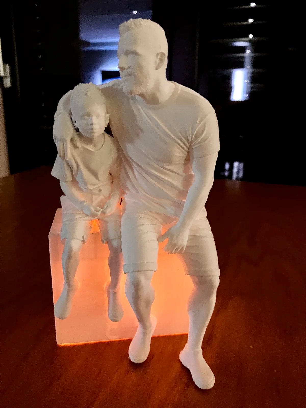 Detail of the same figurine under different lighting