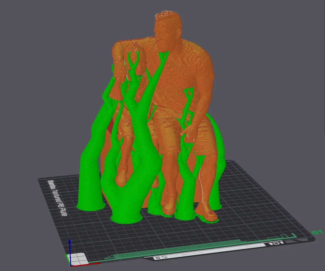 Layer preview of a family figurine with green tree supports